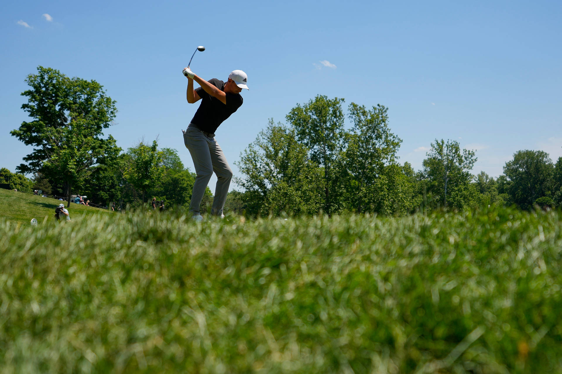 Aaron Wise Playing Golf Background