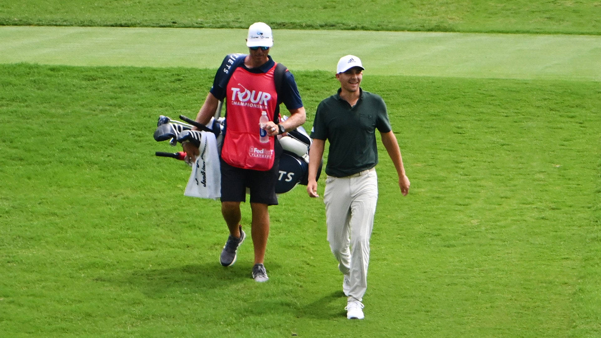 Aaron Wise Walking With His Caddie