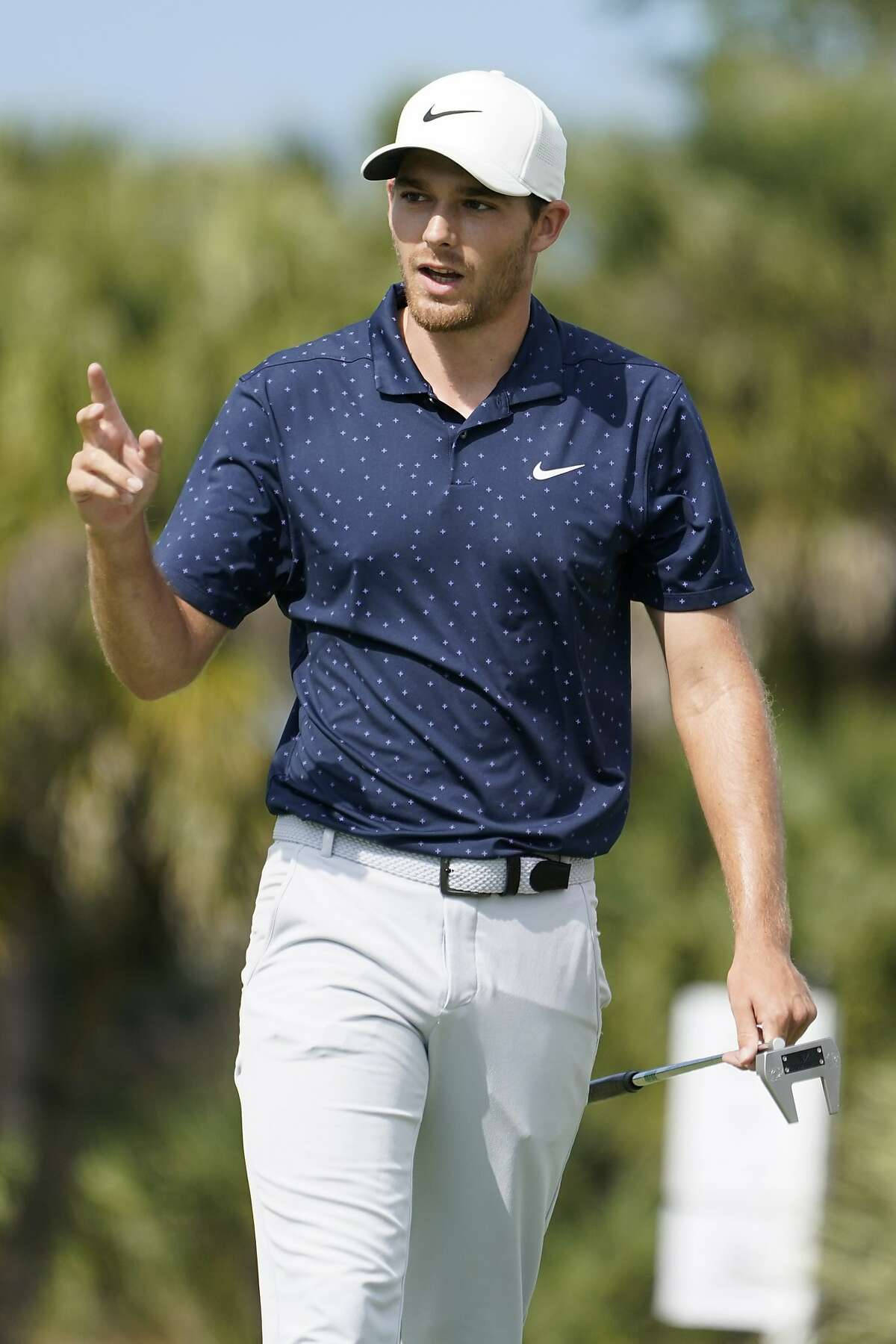 Aaron Wise Wearing A Nike Cap Background