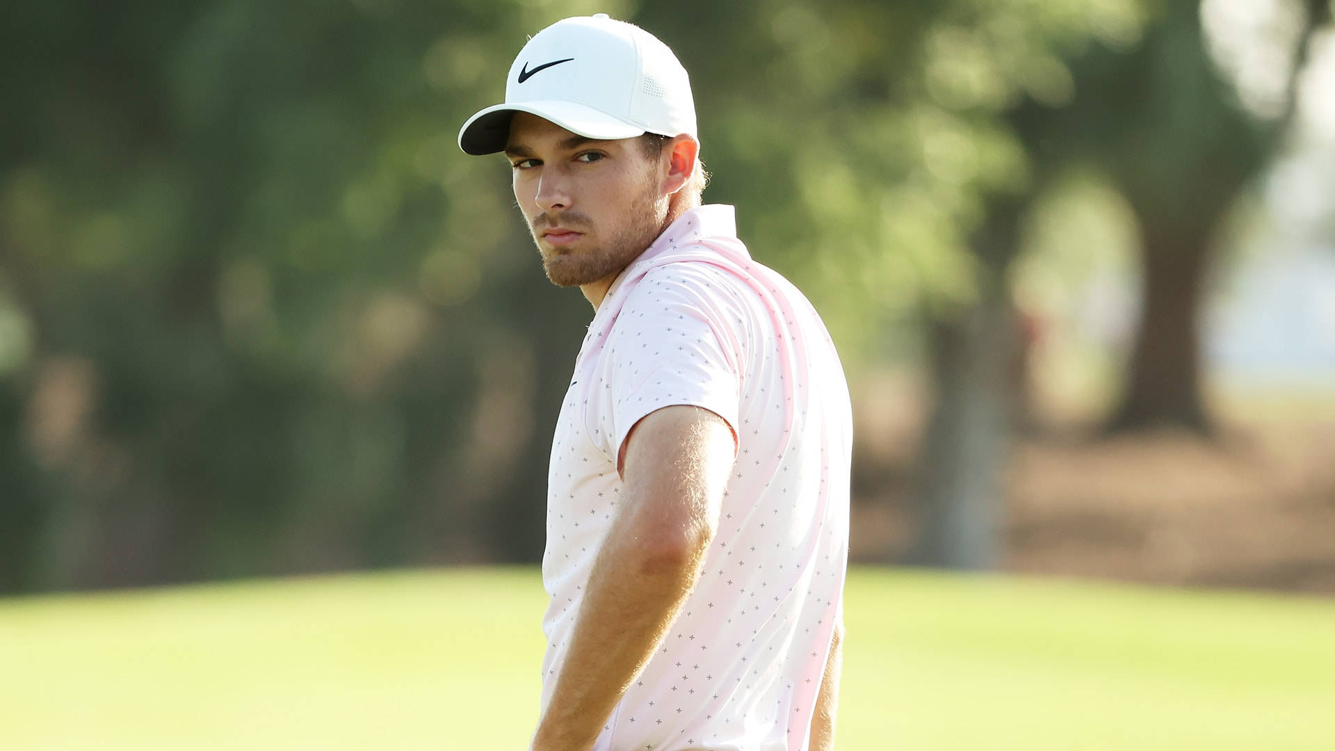 Aaron Wise With Hand On Hip Background