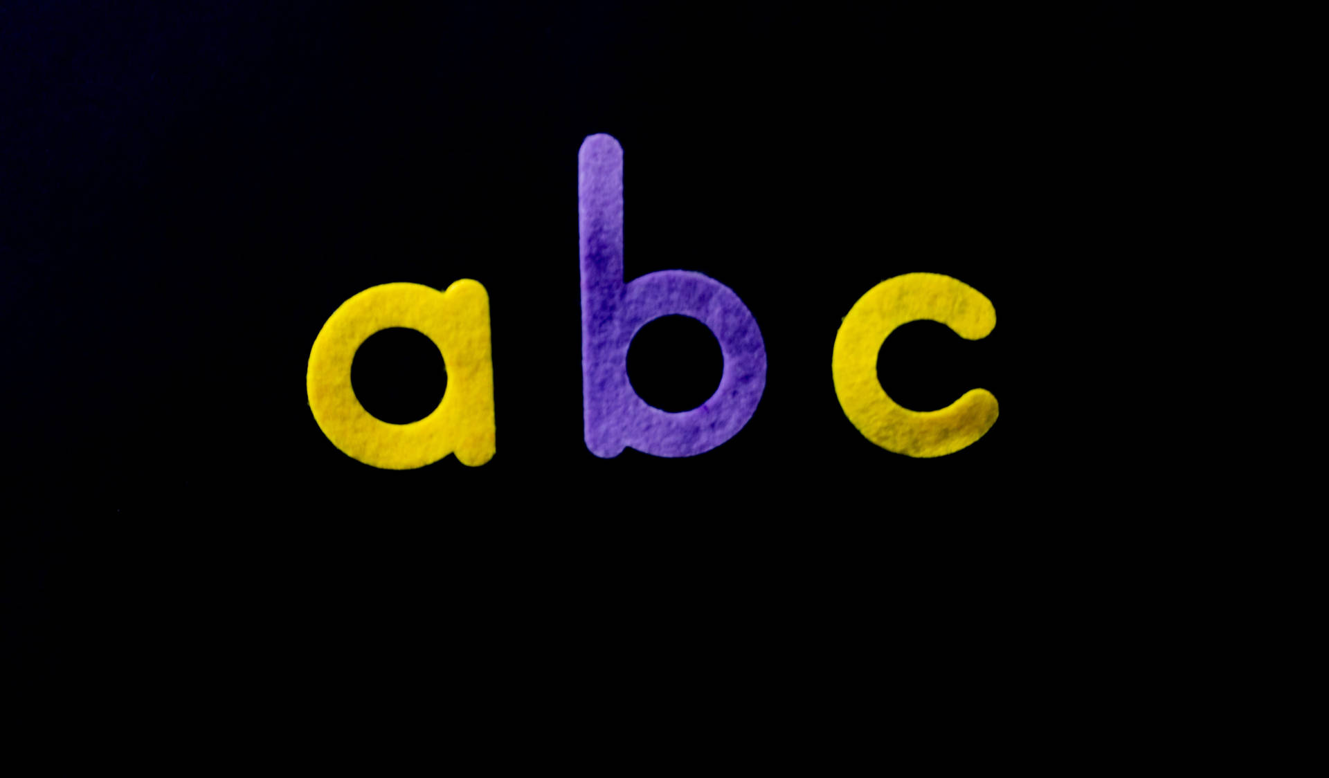 Abc Letters Purple And Yellow Colour