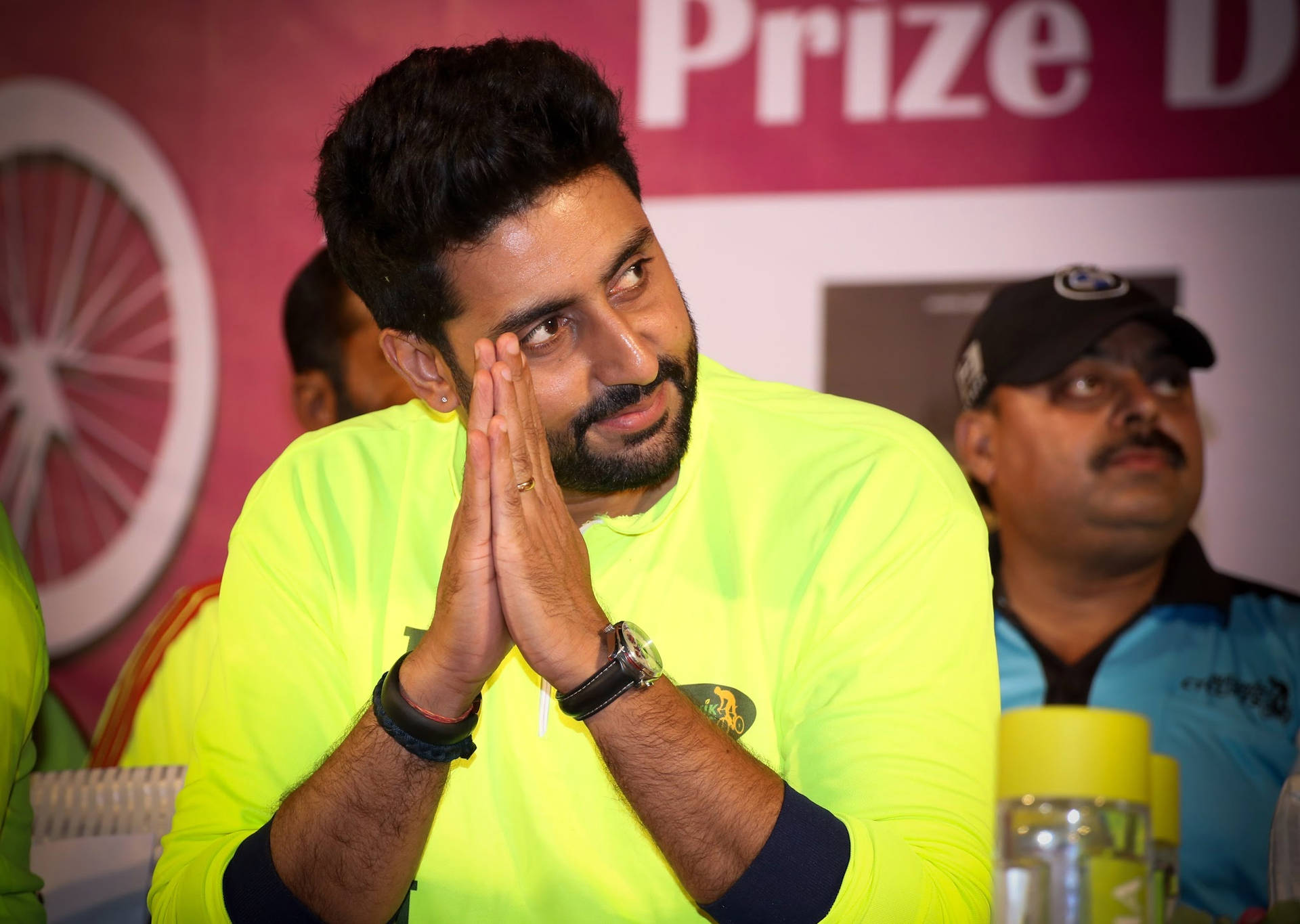 Abhishek Bachchan Wearing Neon Green Shirt Background