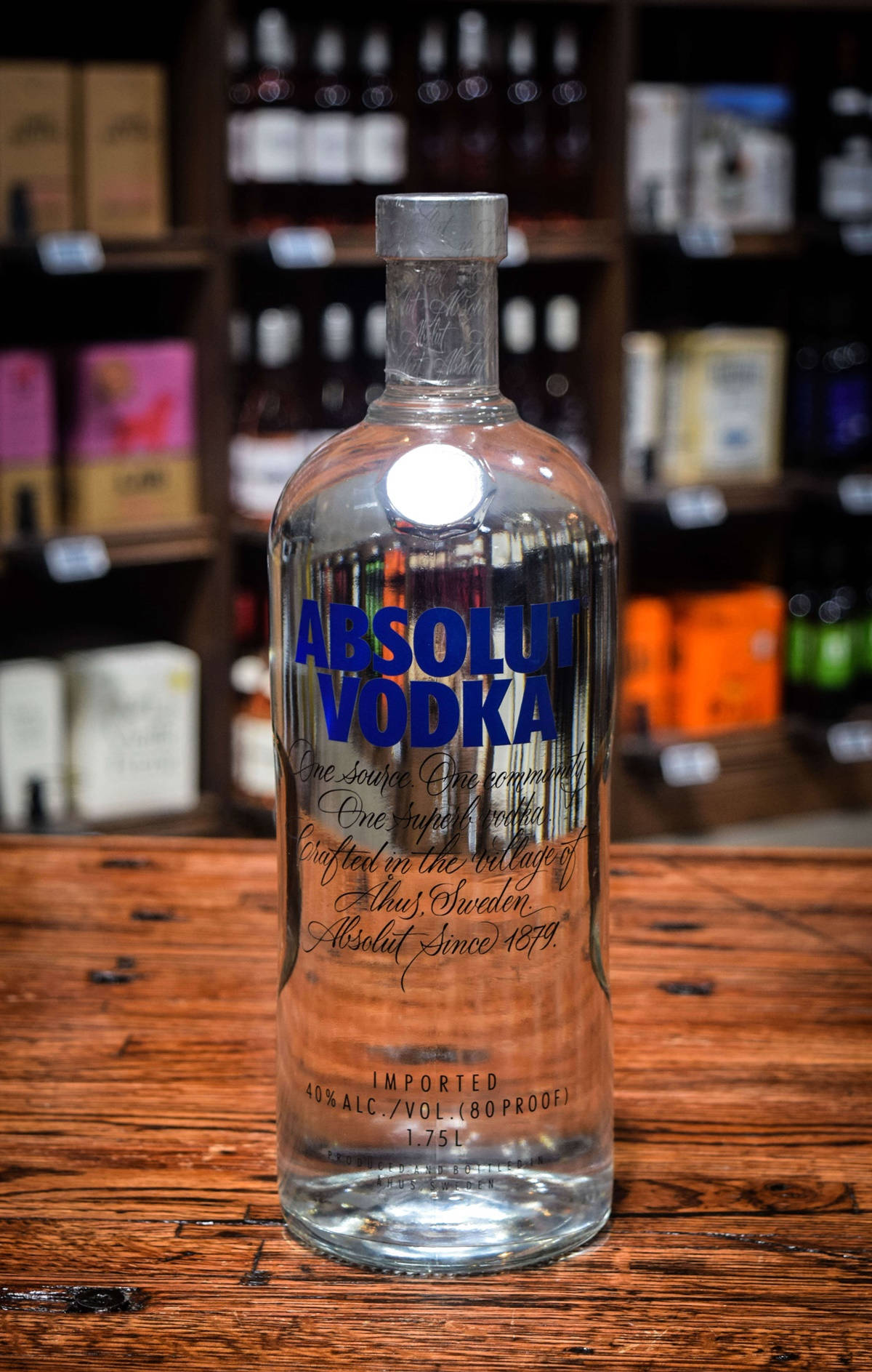 Absolut Vodka Bottle On Wood Table Selective Focus