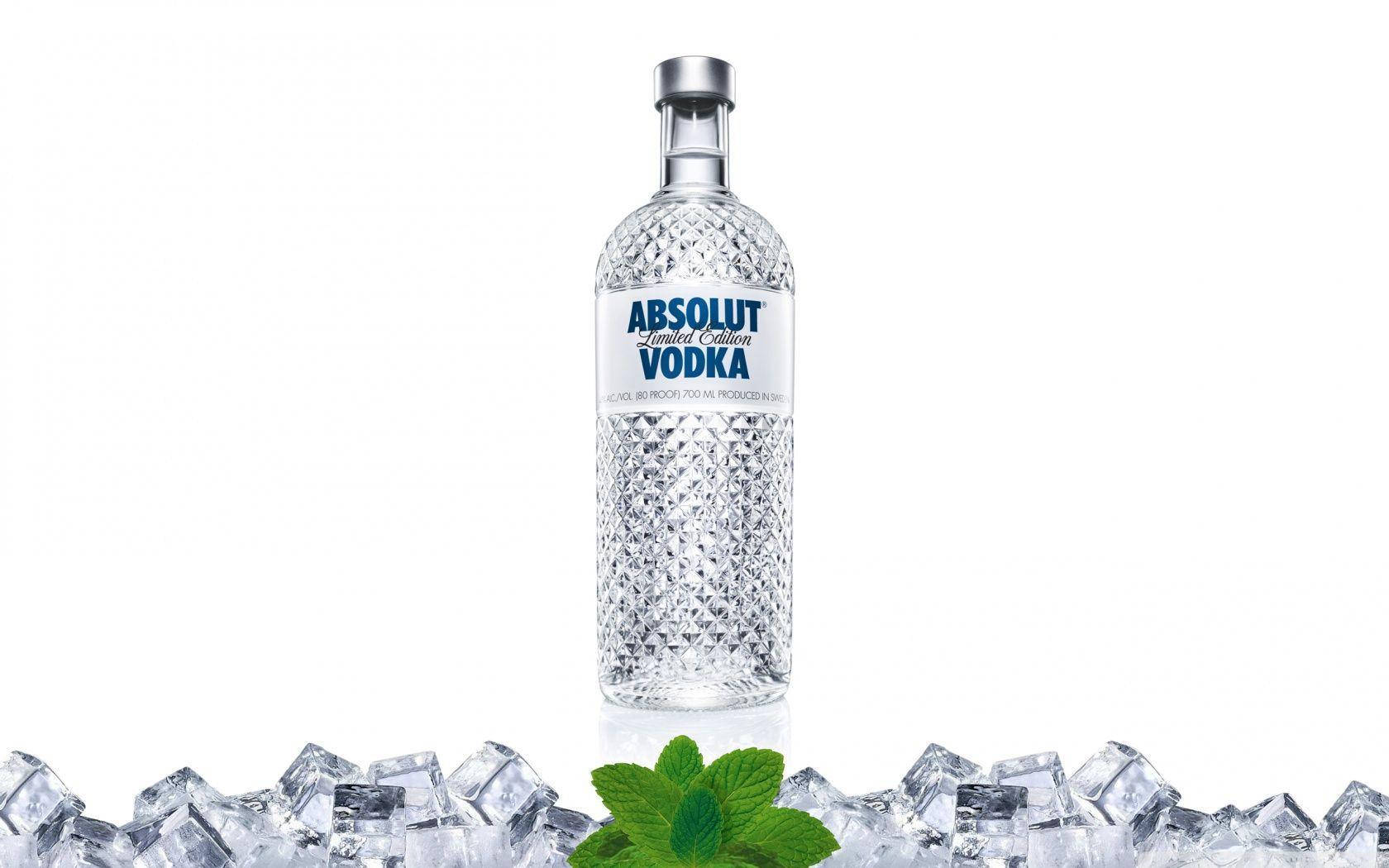 Absolut Vodka Bottle With Ice Cubes Background