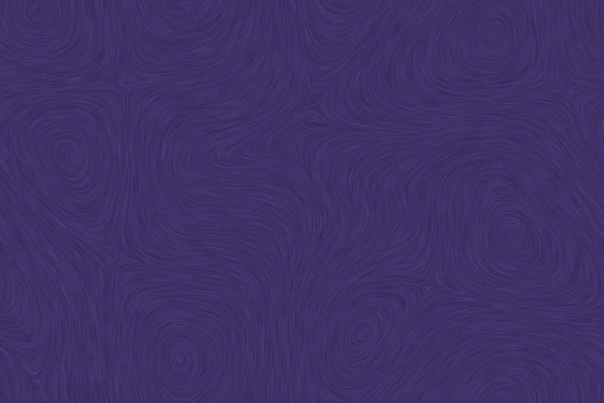 Abstract Background Of A Glowing Purple Color Background