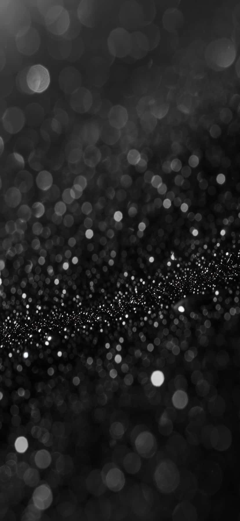 Abstract Black Glitter Bokeh Background