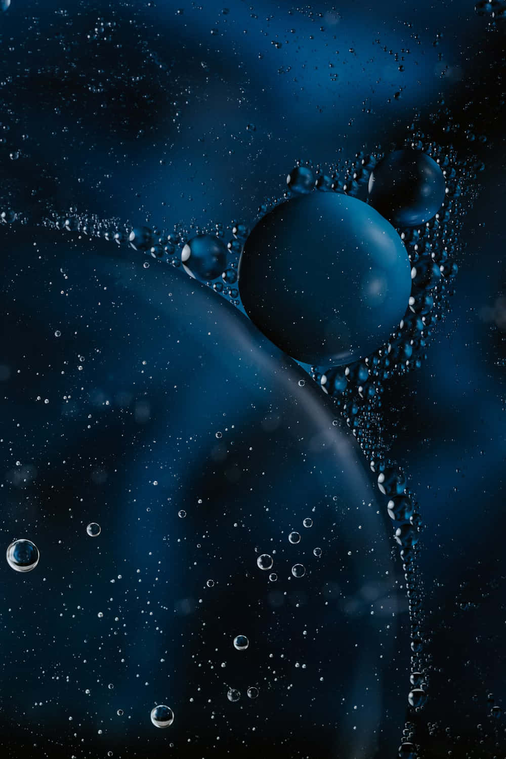 Abstract Blue Oiland Water Droplets Background