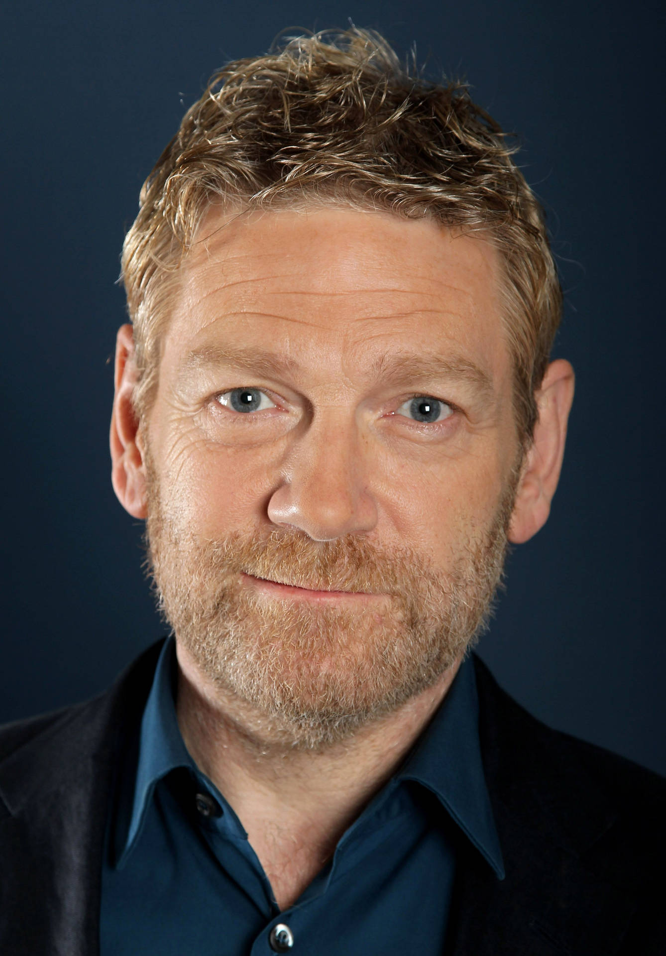 Acclaimed Actor And Director, Kenneth Branagh, In Deep Thought Background