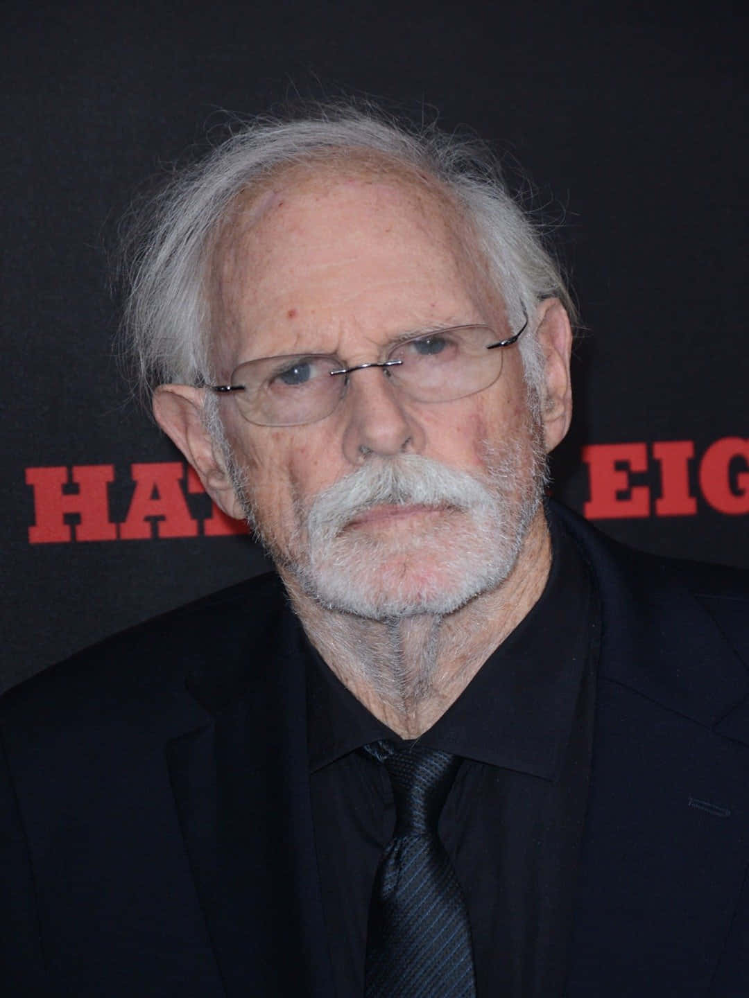 Acclaimed Actor Bruce Dern In Black And White Background