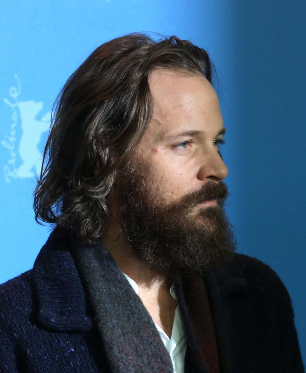 Acclaimed Actor Peter Sarsgaard In A Chic Look. Background