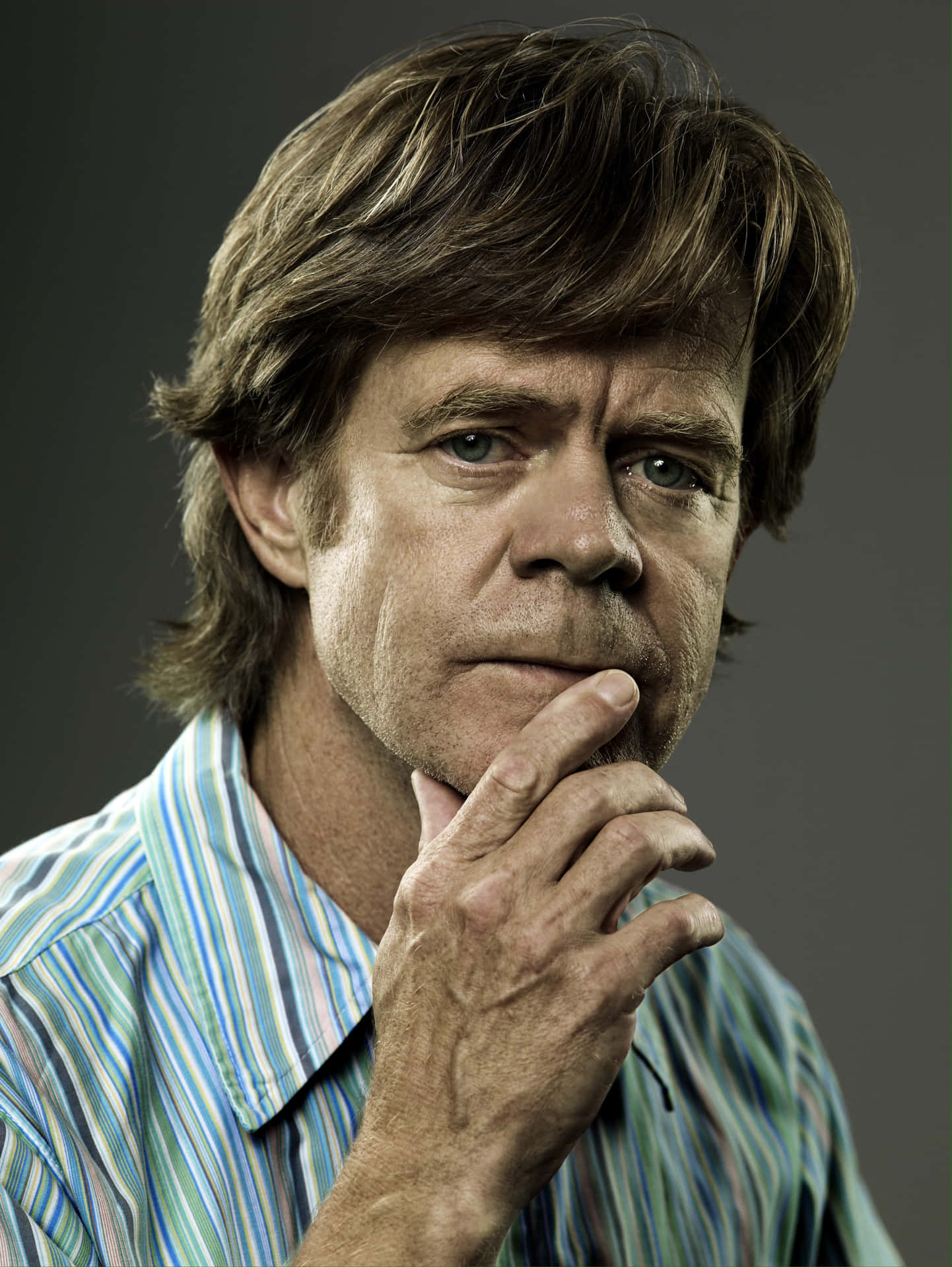 Acclaimed Actor William H. Macy In A Thoughtful Pose Background