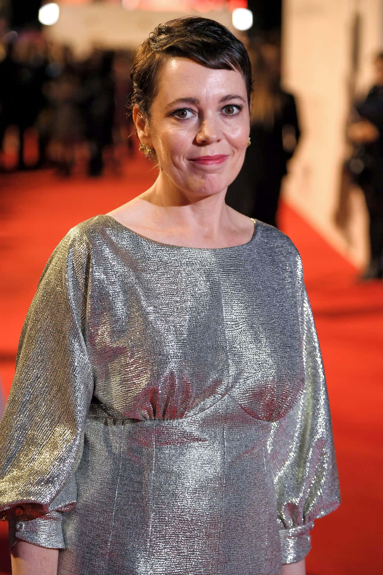 Acclaimed Actress Olivia Colman In Elegant Attire Background