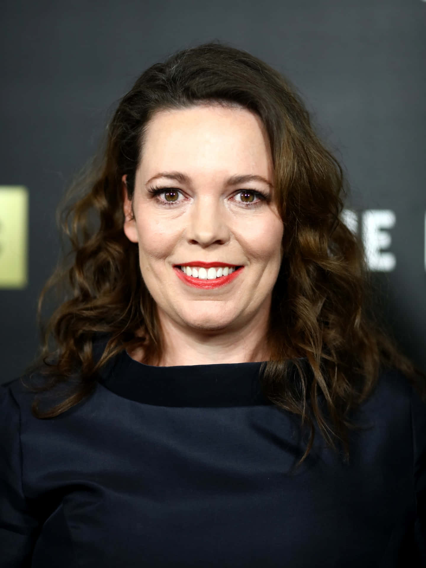 Acclaimed Actress Olivia Colman In Tribute Photoshoot Background