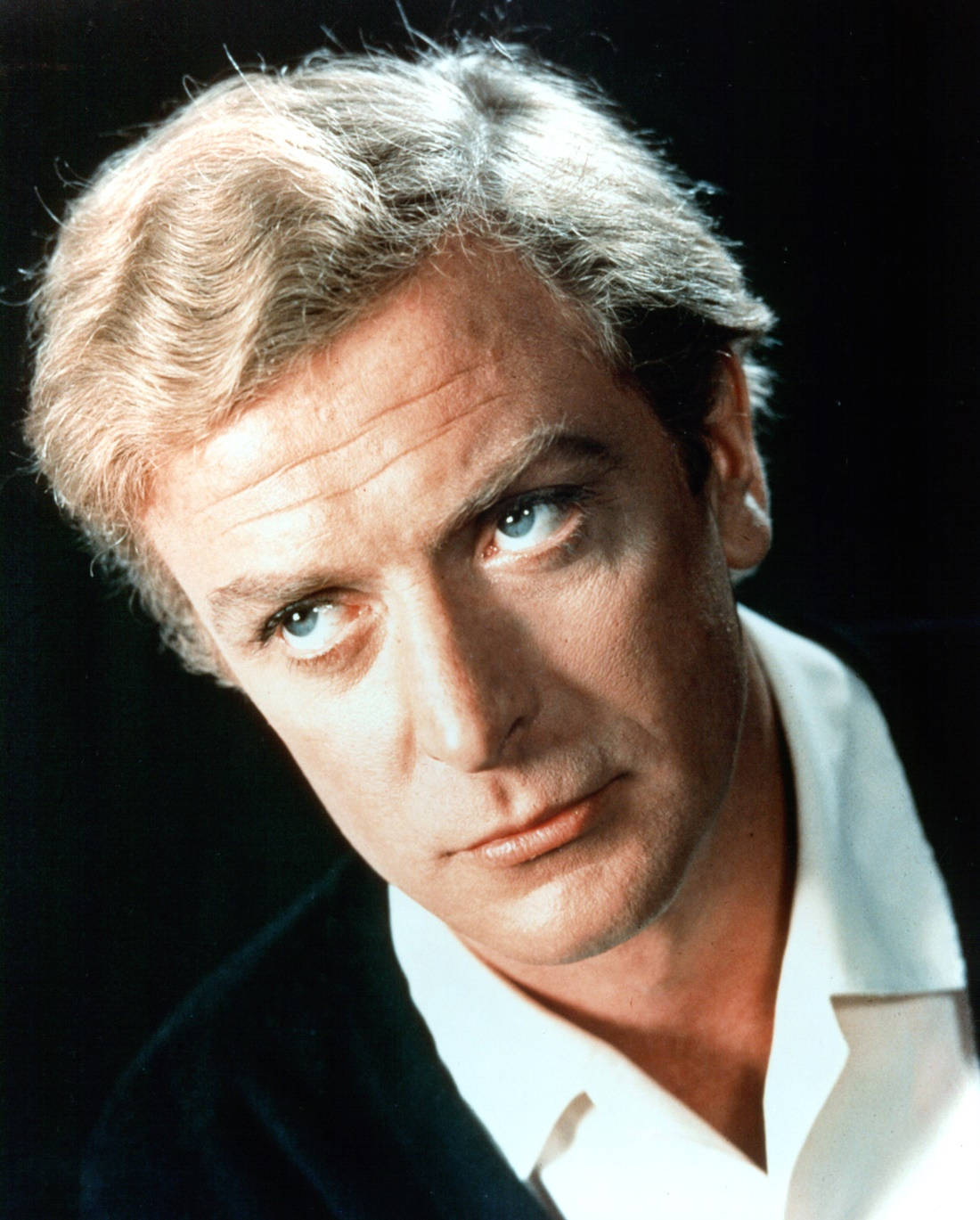 Acclaimed English Actor Michael Caine In Portrait Photography Background