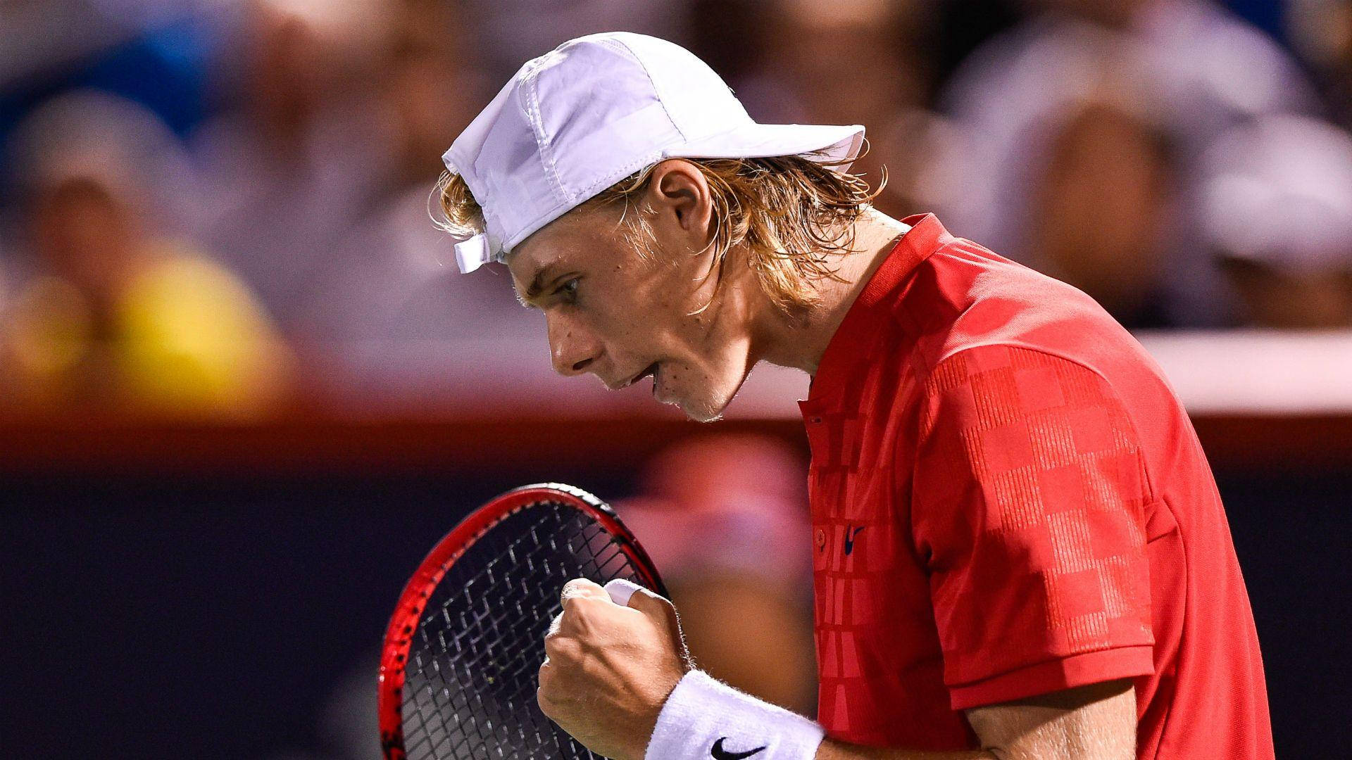 Acclaimed Tennis Athlete Denis Shapovalov In Mid-match Action