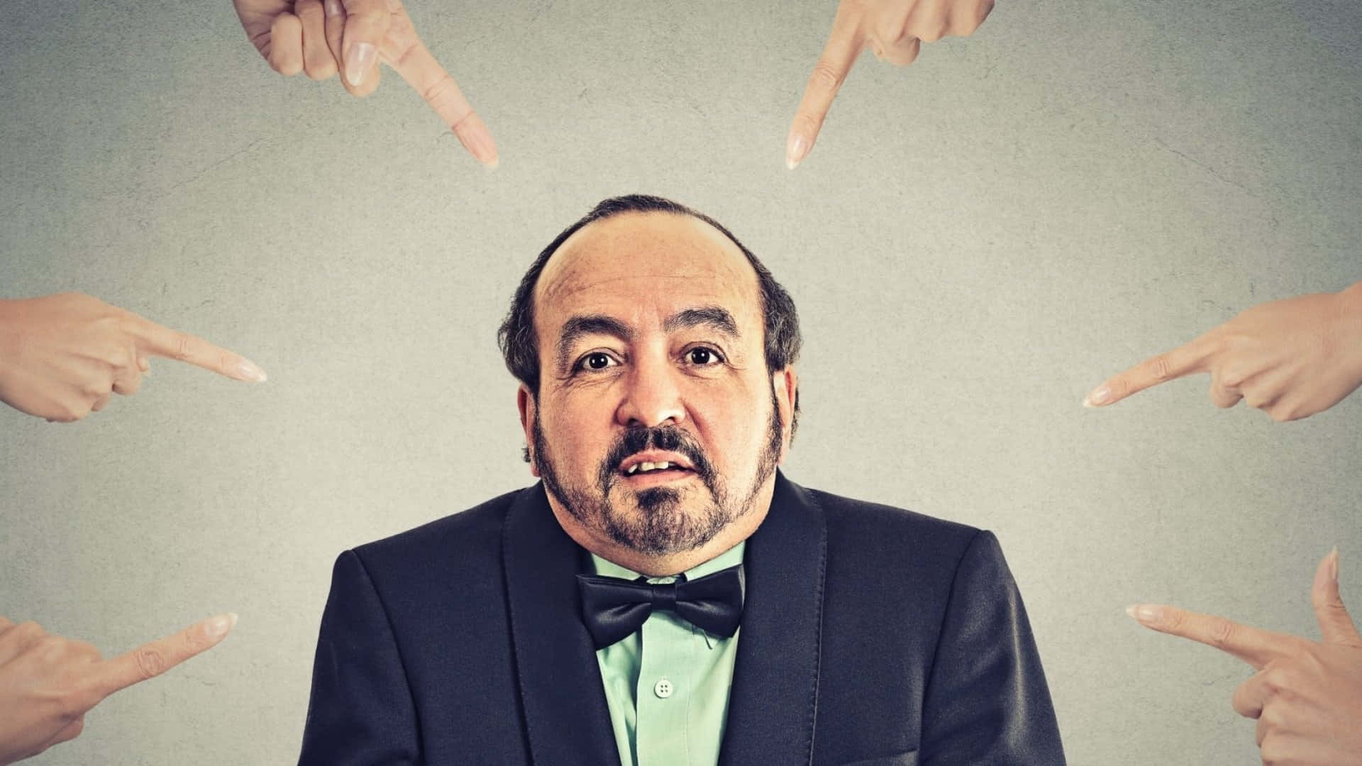 Accused Man Surroundedby Fingers Background