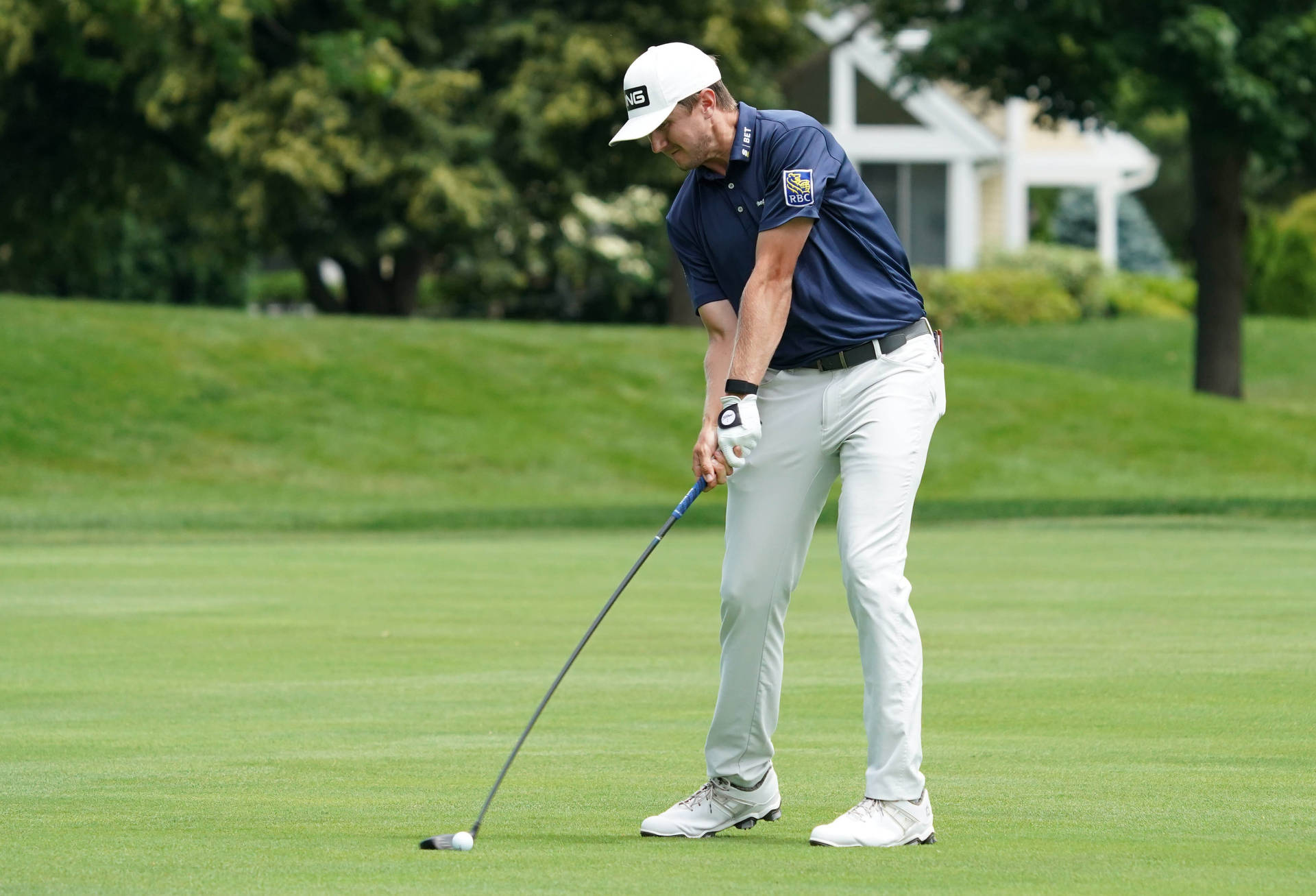 Ace Golfer Mackenzie Hughes In Action Background