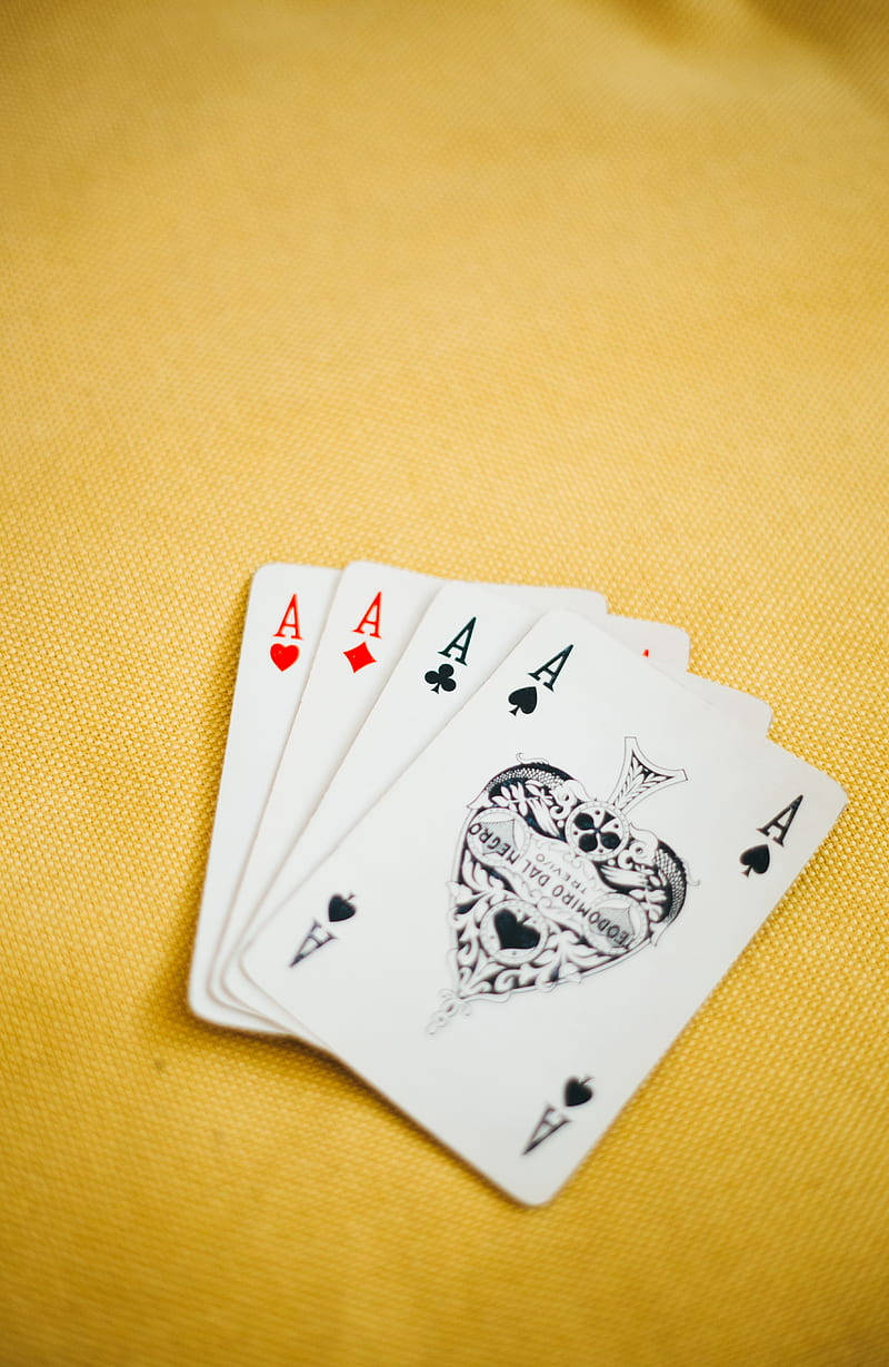 Ace Rummy Cards On Yellow Backdrop