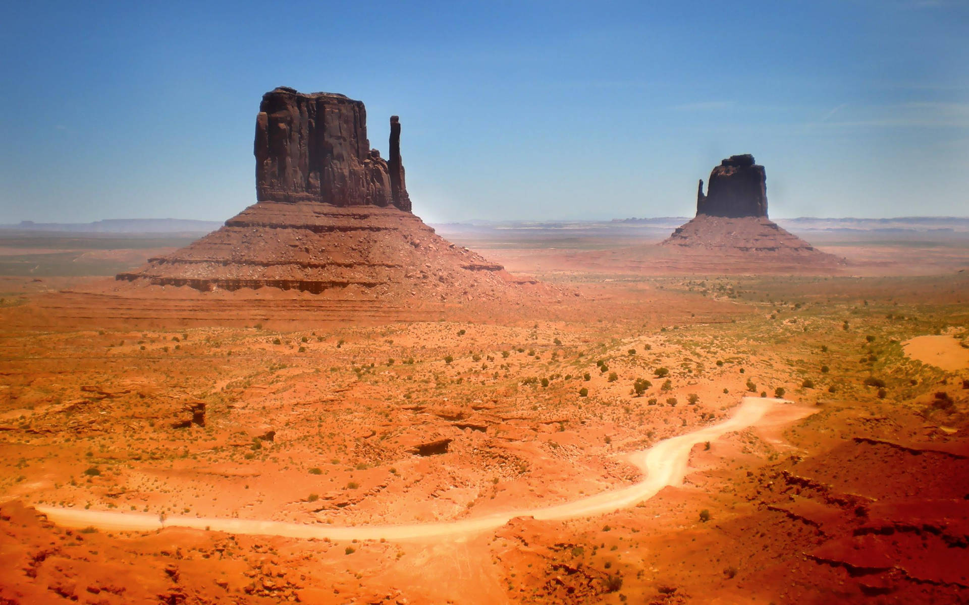 Achingly Beautiful Black Mountain Rocks At Monument Valley Background