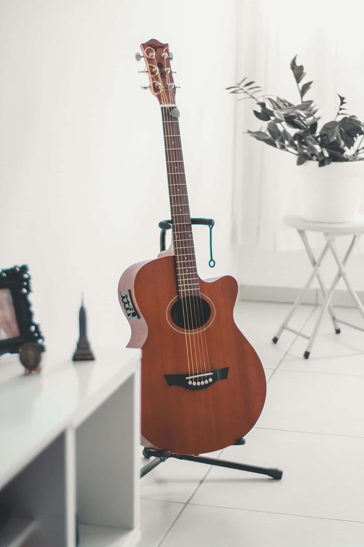 Acoustic Guitarin Modern Interior Background