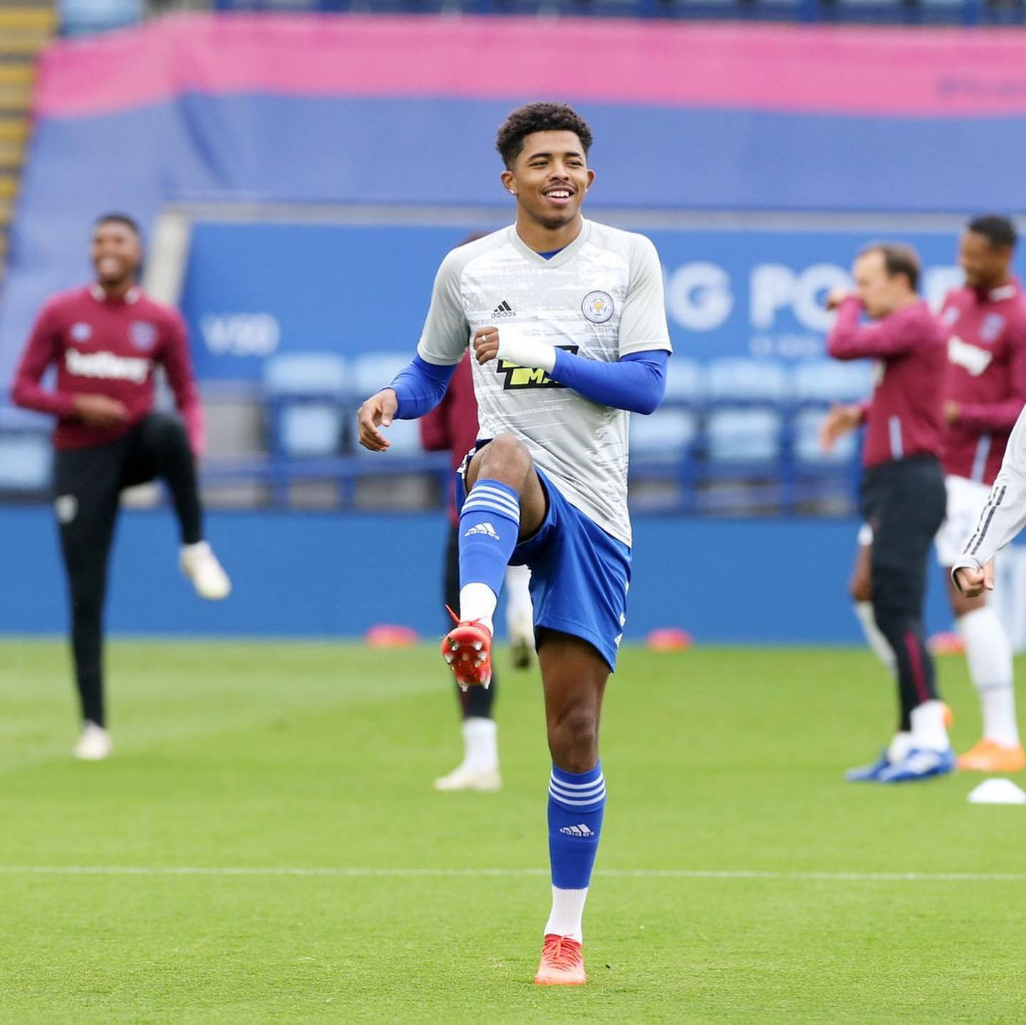 Action Shot Of Wesley Fofana In Mid-skick On The Soccer Field Background