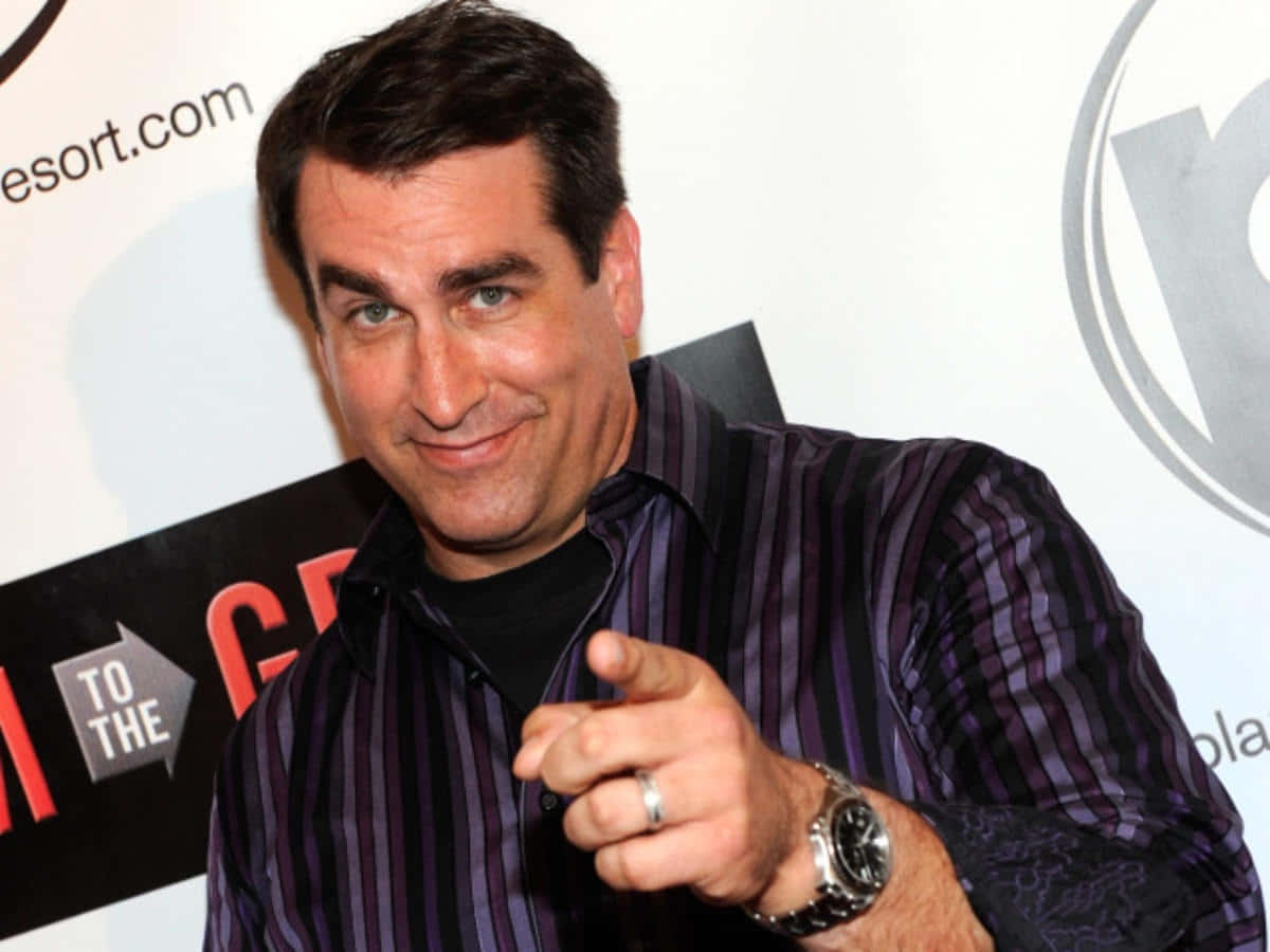 Actor And Comedian Rob Riggle Background