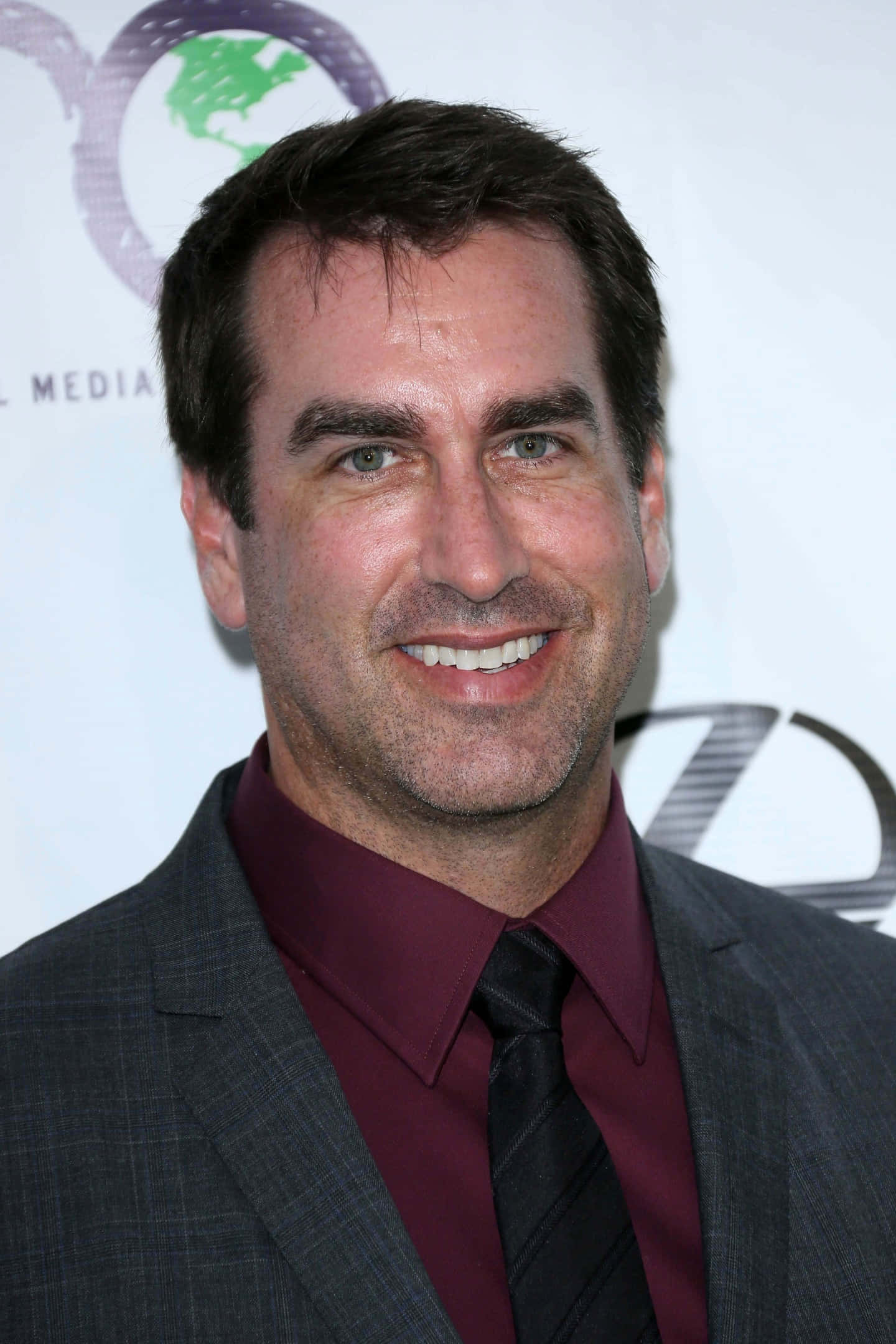 Actor And Comedian Rob Riggle Background