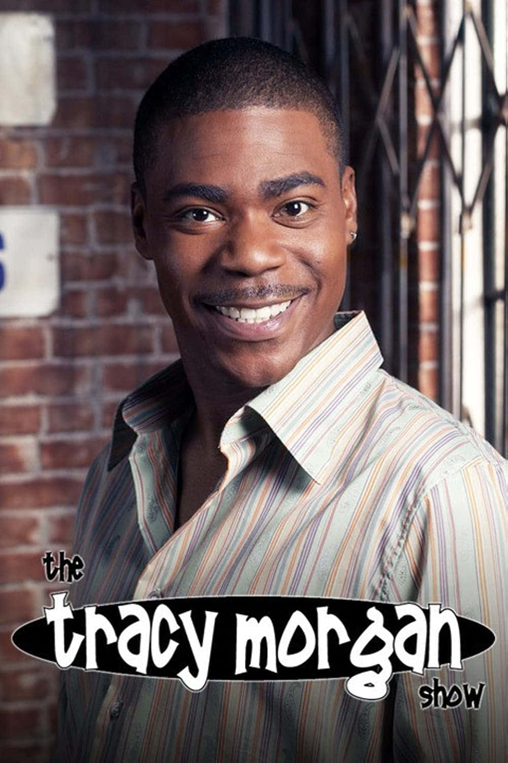 Actor And Comedian Tracy Morgan Posing In A Charming Portrait Background