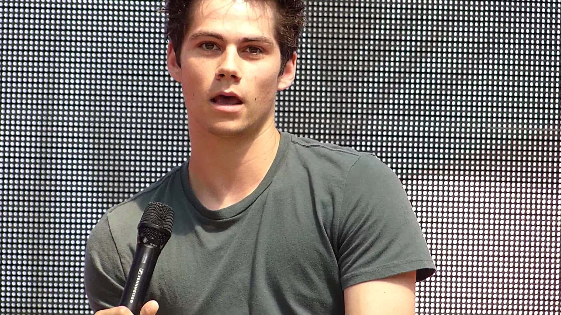 Actor Dylan Obrien In His Role As Thomas In The Movie The Maze Runner Background