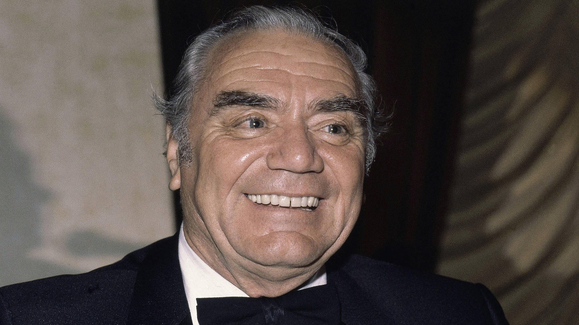 Actor Ernest Borgnine Bright Smile Background