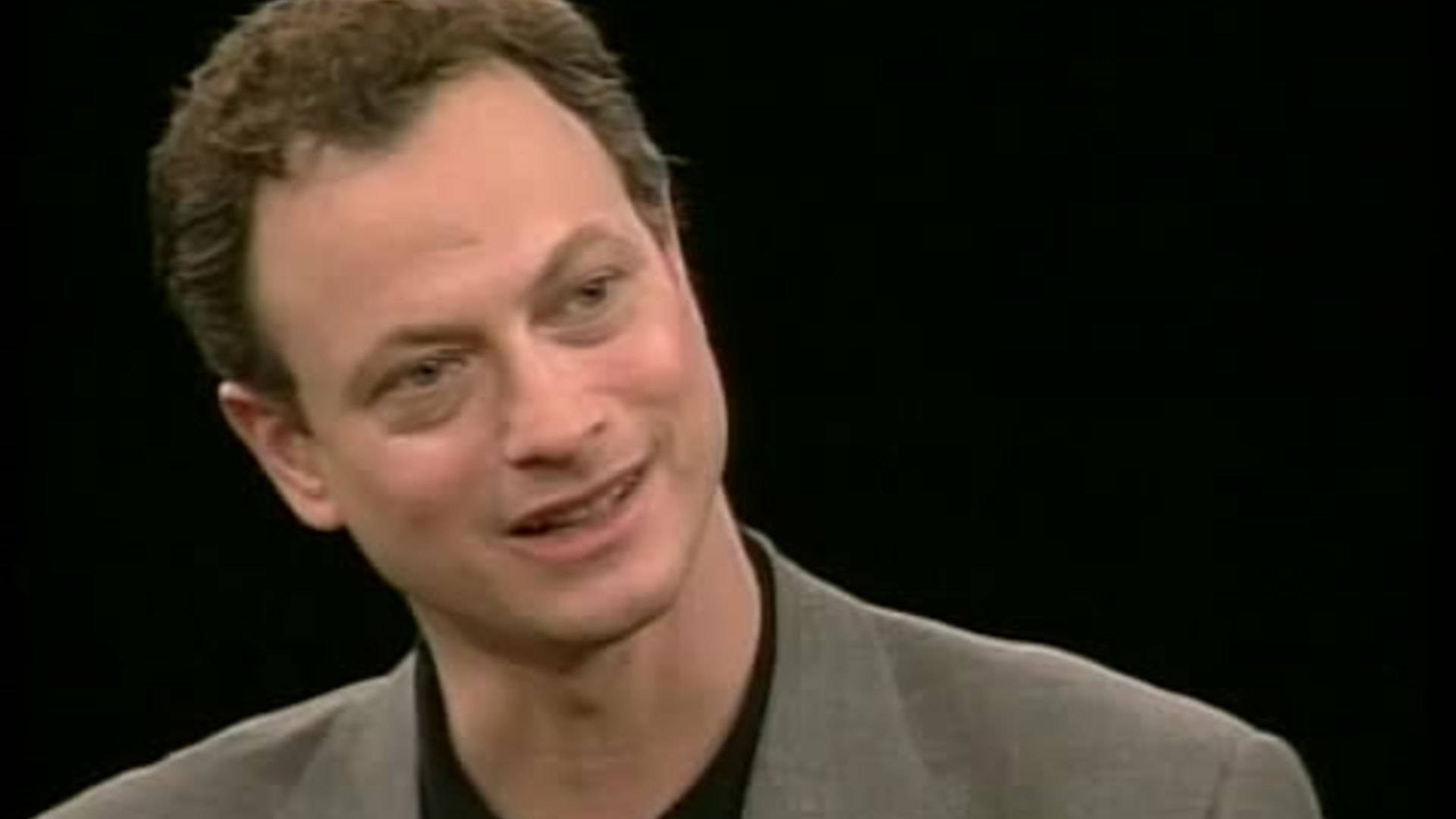 Actor Gary Sinise Smiling Background