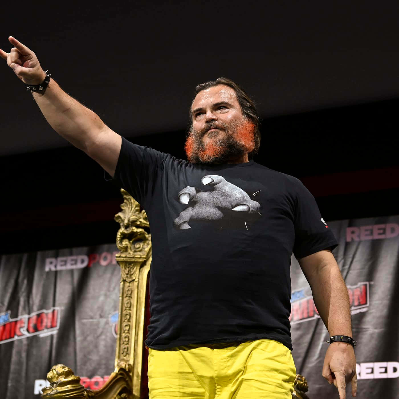 Actor Jack Black Looks Sharp In A Classic White T-shirt And Black Leather Jacket Background