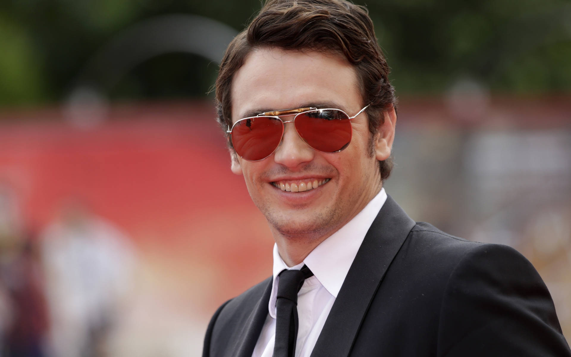 Actor James Franco Wearing Sunglasses Background