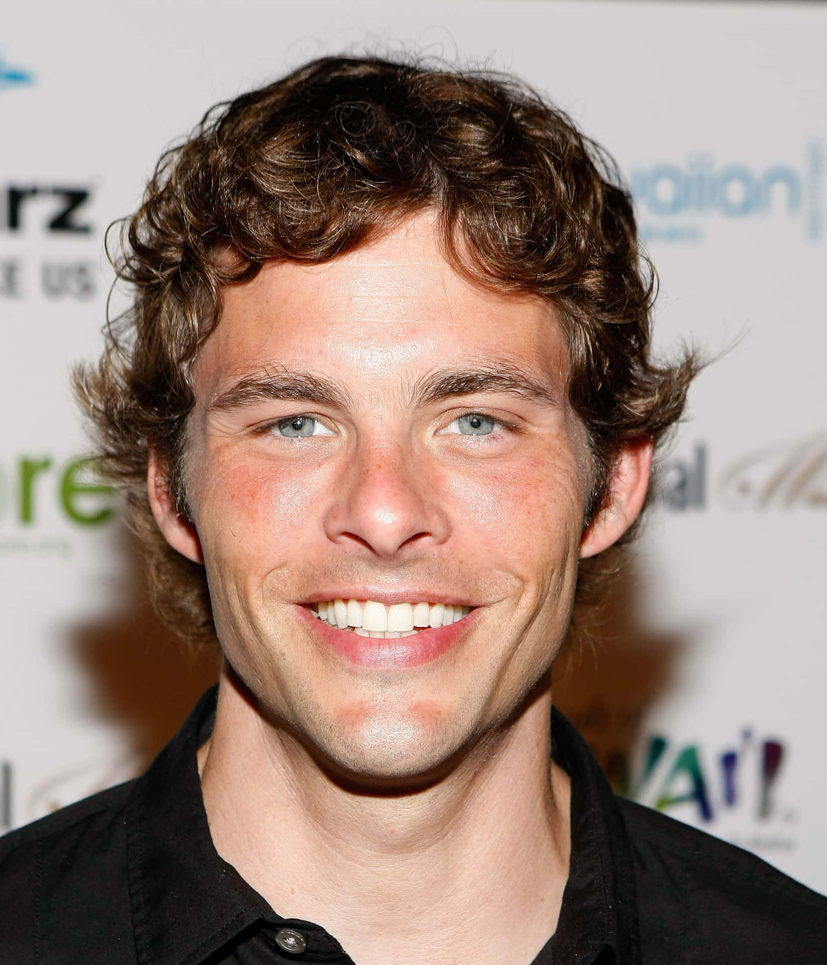 Actor James Marsden Looking Effortlessly Cool In A Casual Nude Shirt. Background