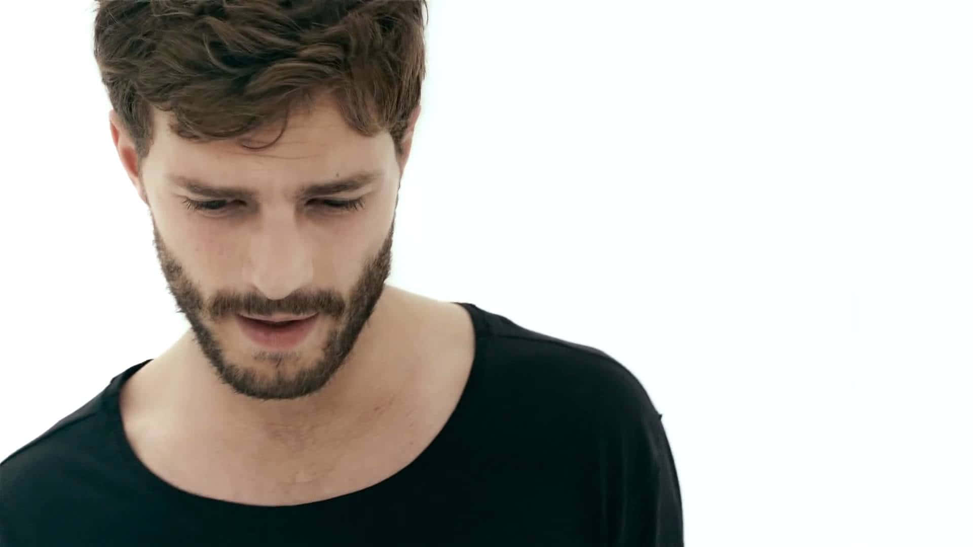 Actor Jamie Dornan Gazing Piercingly| Background