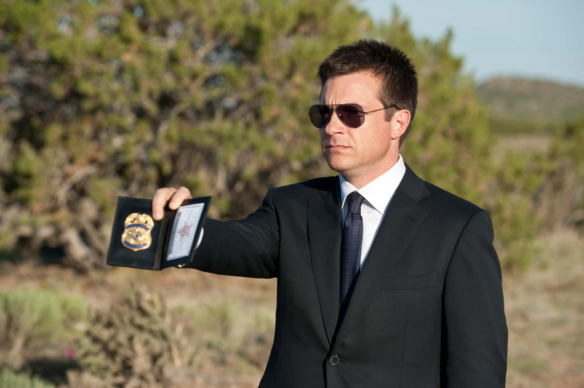 Actor Jason Bateman Staring Intently Background