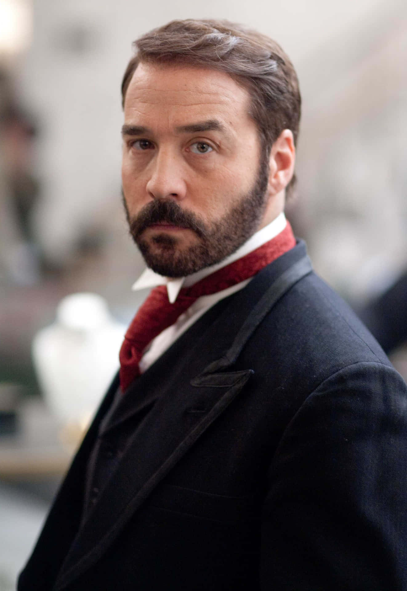 Actor Jeremy Piven With A Confident Smile On His Face. Background