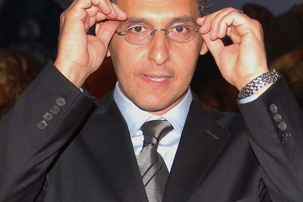 Actor John Turturro Showcasing His Iconic Performance Background