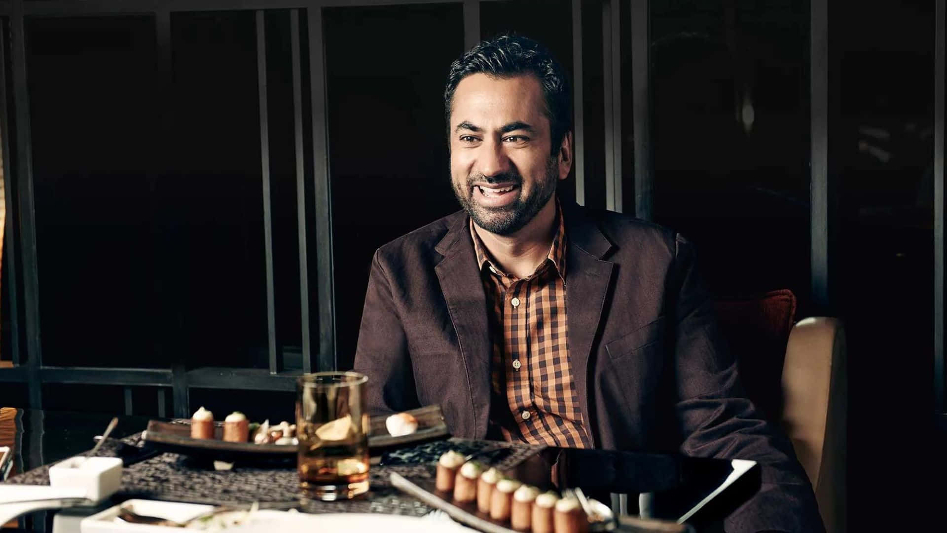Actor Kal Penn Posing For A Photoshoot