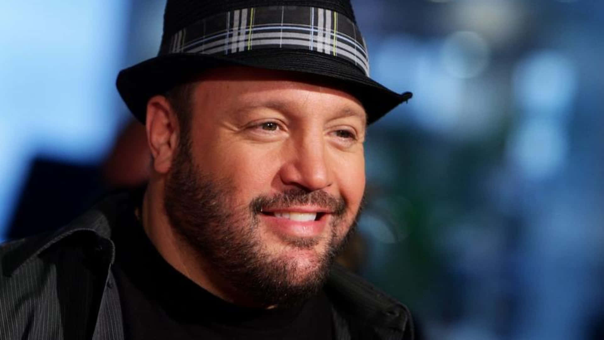 Actor Kevin James Is Smiling Widely Background
