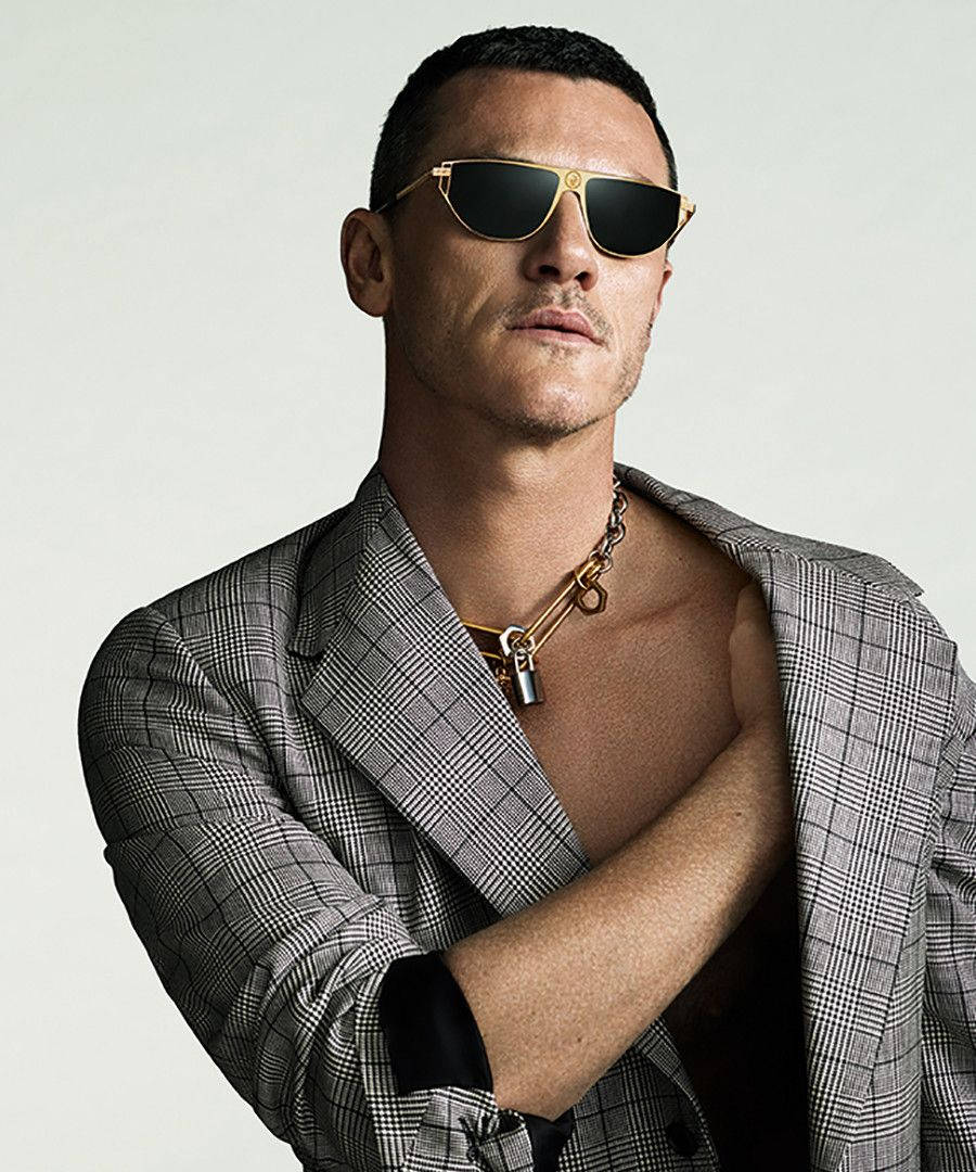 Actor Luke Evans Versace Eyewear Background