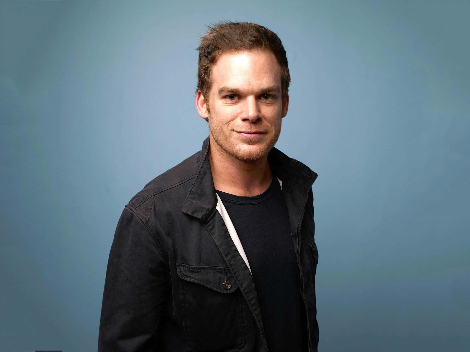 Actor Michael C. Hall In A Blue Suit Background