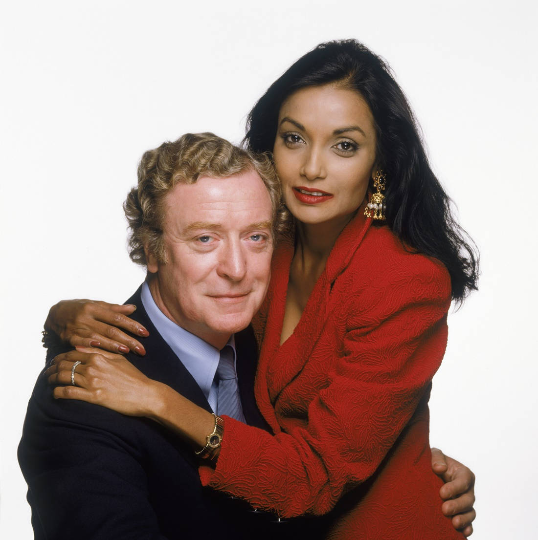 Actor Michael Caine And His Wife Shakira Caine Background