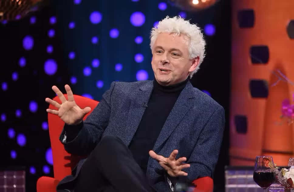 Actor Michael Sheen In A Perfectly Tailored Suit Background