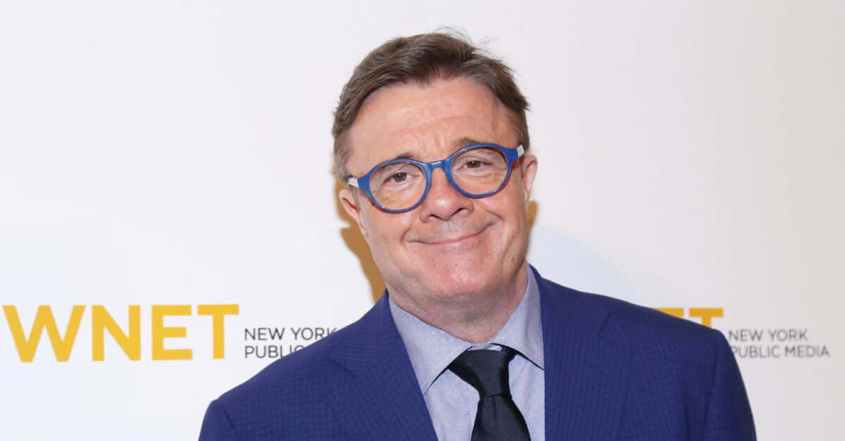 Actor Nathan Lane As A Star In The Theatre Background