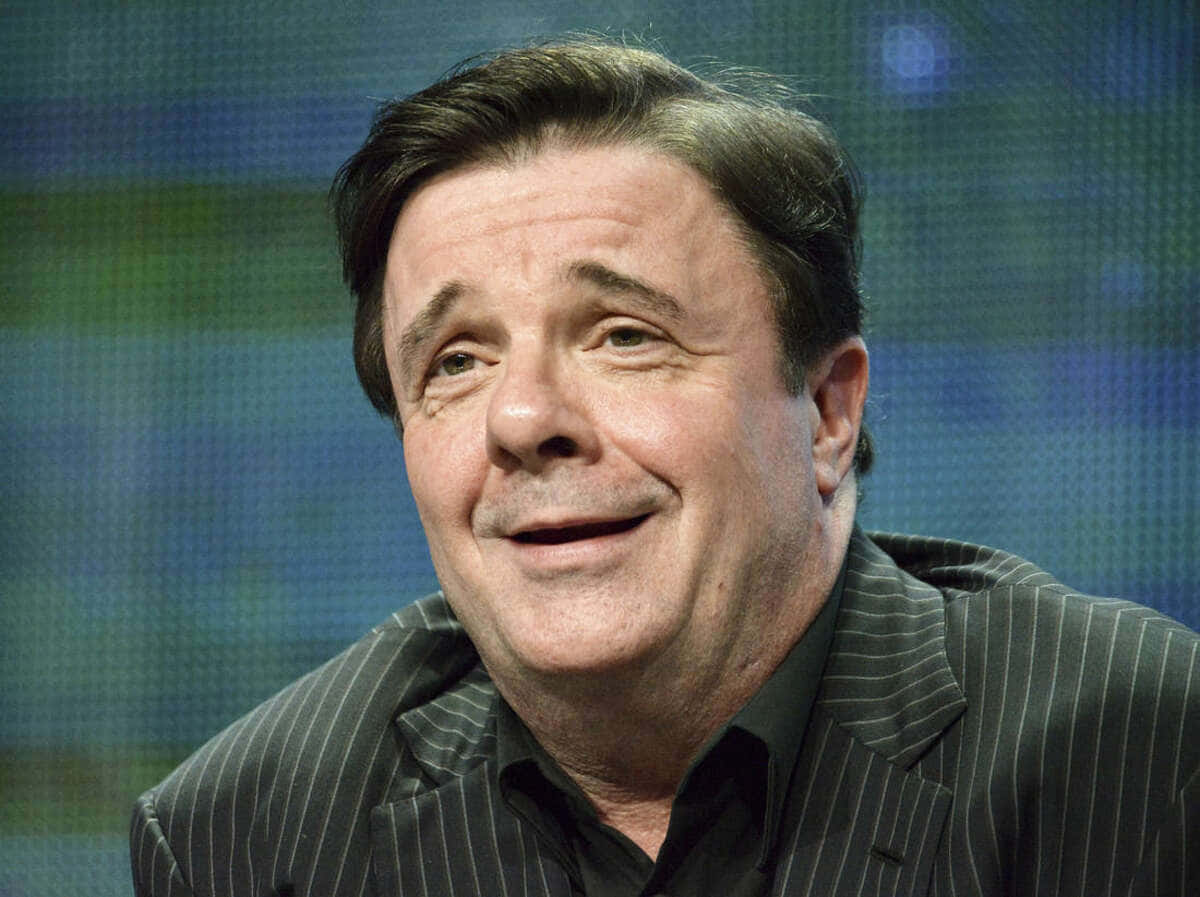 Actor Nathan Lane Attending An Event Background
