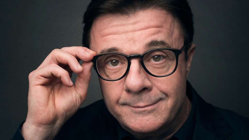 Actor Nathan Lane Lights Up The Stage Background