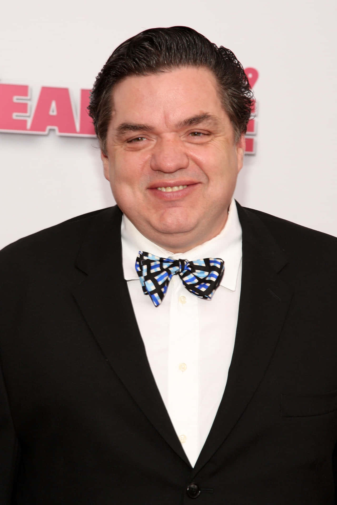 Actor Oliver Platt Gracing The Red Carpet Background
