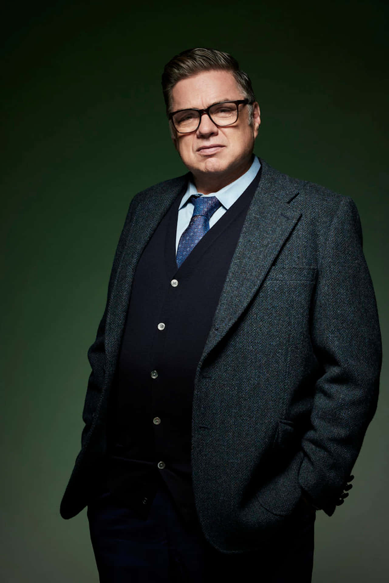 Actor Oliver Platt In A Monochrome Suit Background
