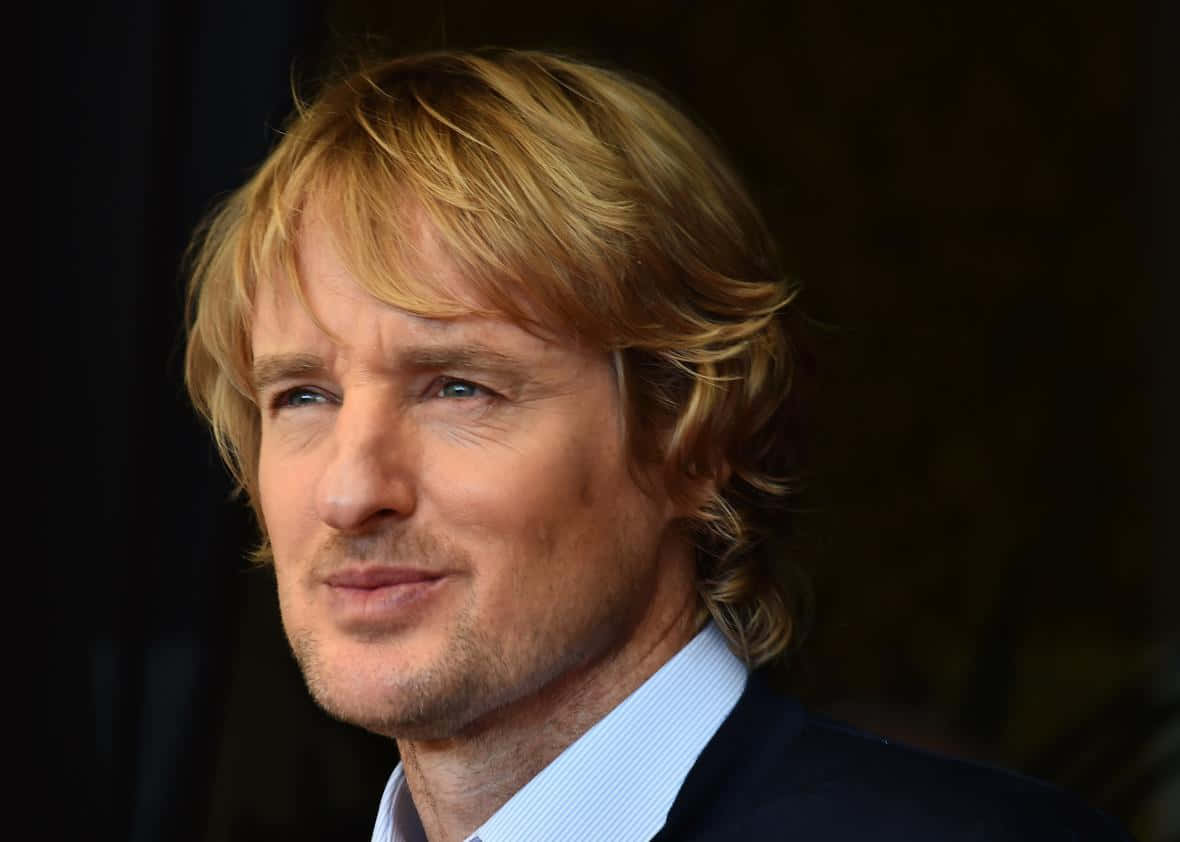 Actor Owen Wilson Has A Smile From Ear To Ear. Background